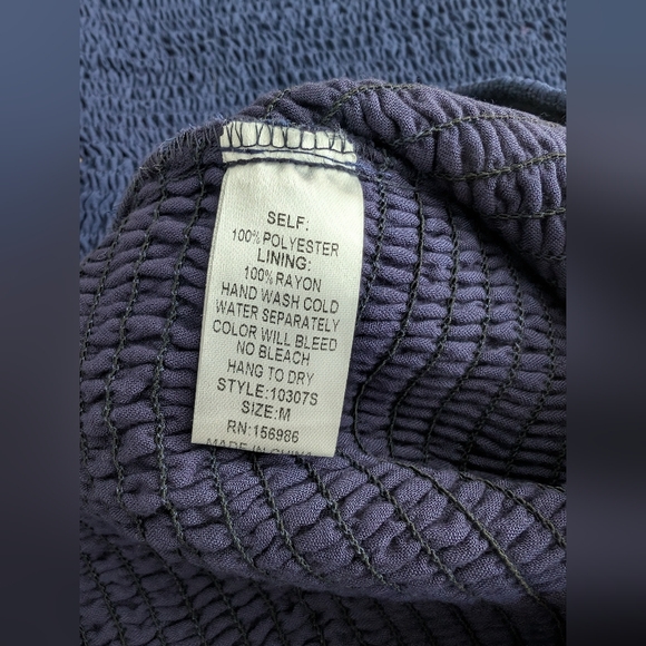 idem ditto off-the-shoulder smocked crop top with a matching ruffled mini skirt - Picture 8 of 8